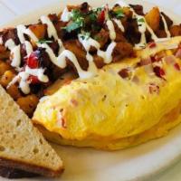 Denver Omelet · Ham, bell peppers, onions, cheddar. Served with breakfast potatoes and toast.