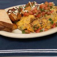 Southwestern Omelet · Chorizo, mushrooms, jalapenos, onions, avocado and jack cheese topped with pico de gallo. Se...