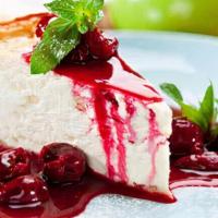 Vegan Cheesecake · Vegan Soy Cheesecake. Homemade Cranberry Sauc reduction