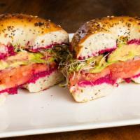 Becky's Bagel · Tomatoes, red onion, avocado, alfalfa sprouts, fresh cracked pepper. Choice of hummus or cre...