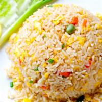 Fried Rice · Fresh egg, tomatoes, onions, peas, and carrots stir fried with seasoned rice.