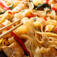 Pad Kee Mao · Flat rice noodles prepared with choice of protein, broccoli, tomatoes, bell pepper, basil, a...
