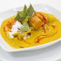 Yellow Curry · Hearty curry prepared with choice of protein, potatoes, carrots, and onions.