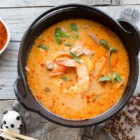 Tom Yum Soup · Traditional Thai soup loaded with mushrooms, lemongrass, galanga, fresh lime juice, tomatoes...