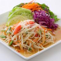 Papaya Salad · Spicy. Shredded green papaya, tossed with locally grown tomatoes, green beans, dried shrimp,...