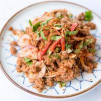 Larb Salad · Spicy. Choice of protein tossed with toasted rice, green onions, mint leaves, and a house ma...