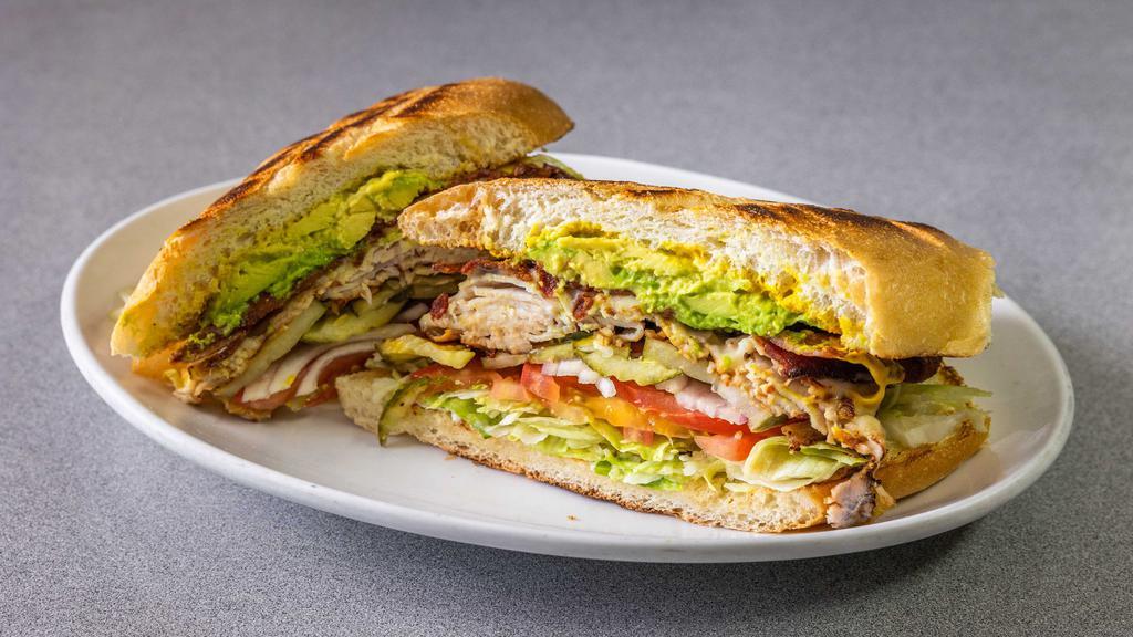 T.B.A. Melt · Grilled turkey, bacon, avocado, and melted Swiss.