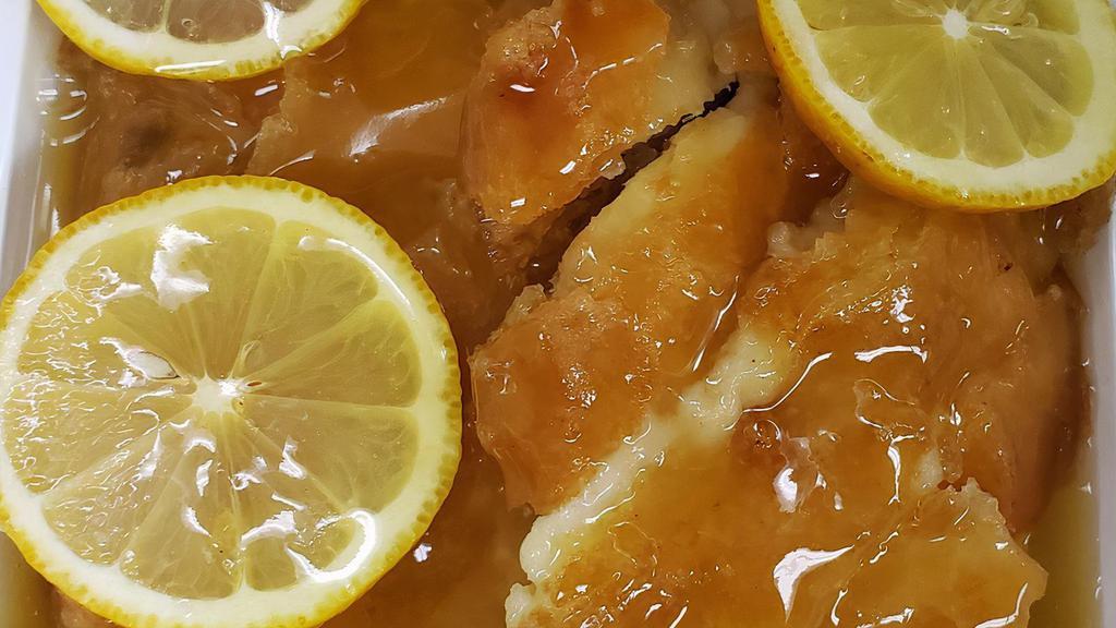 Lemon Chicken · Crispy white meat chicken in a tangy lemon sauce, made with locally grown fresh lemons.