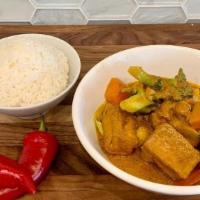 Vegetable Tofu Curry. · Yellow Madras curry with a variety of seasonal vegetables & tofu, served with Jasmine rice (...
