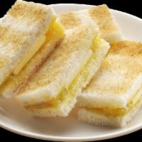 Kaya Toast with Butter. · Traditional homemade Kaya Jam with butter, served on toasted Pullman Bread