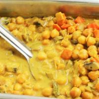 Curry Garbanzo · Gluten-free. A rich, creamy delectable stew of garbanzo beans, sweet peppers, mushrooms, oni...