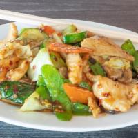 Hot Wok Chicken Fillet · Sliced Chicken Breast with Mixed Vegetables in A Sweet & Spicy Garlic Sauce.