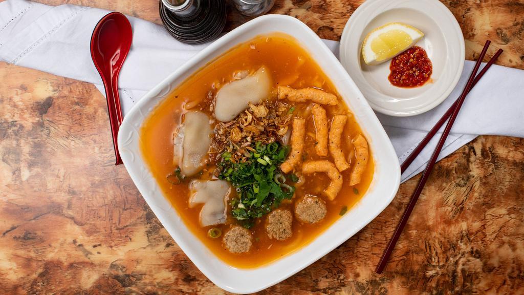 11. Bánh Canh Suông, Chả Cá, Giò Heo · Udon with Shrimp Sausages, Fish Cake, Pork Knuckle