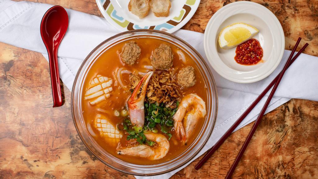 9. Bánh Canh Hải Sản · Udon with Crab Claw, Shrimps Squid, Fish Cake. Giò chảo quẩy đã tặng kèm (served with Chinese donuts).
