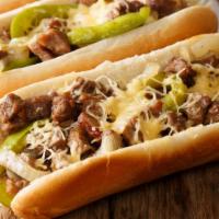 Philly Cheesesteak Sandwich with Bacon & Jalapeños · Philly Cheesesteak sandwich made with steak strips, bacon, cheese, onions, and jalapeños.