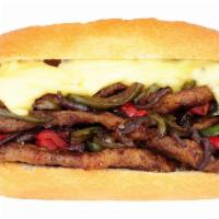 Texan Philly Cheesesteak Sandwich · Philly Cheesesteak sandwich made with steak strips, bacon, cheese, peppers, and onions, and ...