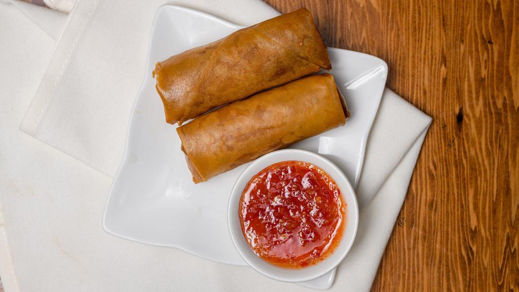 Crispy Egg Rolls (2) · Crispy fried Egg Rolls filled with pork, shrimp, fine vermicelli and vegetables. Served with a sweet and tangy dipping sauce. ( 2 rolls)