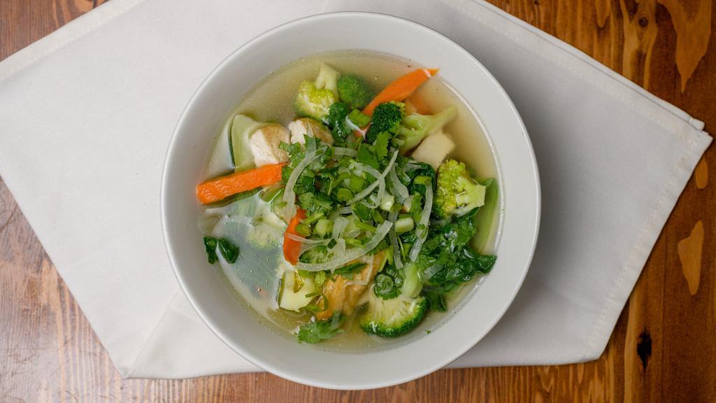 Vegetarian Pho · Mix of vegetables include bokchoy, carrots, broccoli and tofu. (All Pho soups served with side condiments of fresh basil, lime, and sprouts.  Garnished with onions and cilantro.)