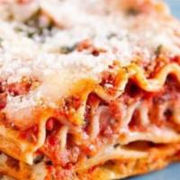 Lasagna · Organic house made lasagna pasta sheets, layered in a béchamel sauce, finished with Parmigia...