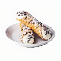 Cannoli Siciliani · Italian pastries consisting of tube-shaped shells of fried pastry dough, filled with a sweet...