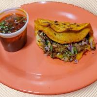 Quesabirria · Try our delicious quesabirria this semi crisp tortilla is dipped in braising liquid and sear...