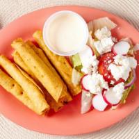 Taquitos Dorados · Six fried chicken taquitos with salad, sour cream and cheese.