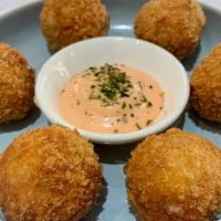 Barbecued pork croquettes (6) · Fried breaded rolls with creamy center mixed with taro and diced barbecued pork