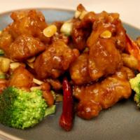 General Tso's Chicken · Spicy. Breaded chicken sauteed with dried chili pods in a honey-based red pepper sauce.