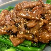 Beef with broccolini · Sliced beef sauteed with black bean and tender broccolini
