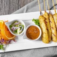 Chicken Satay(5pcs) · Grilled chicken on skewers marinated with Thai spices served with peanut sauce and cucumber ...
