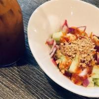 Cucumber Salad · Sweet and sour dressing,with crushed peanut,carrot and red onion.