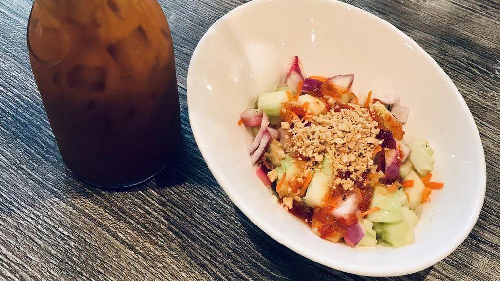Cucumber Salad · Sweet and sour dressing,with crushed peanut,carrot and red onion.
