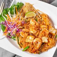 Pad Thai Noodle · Spicy. Stir-fried thin rice noodle, shrimp, dry shrimp, egg, ground peanut, tofu and bean sp...