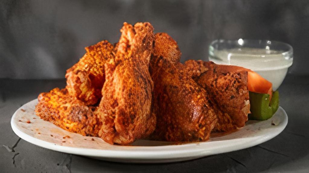 Cajun Wings · Wings tossed in a dry, classic Louisiana spice..