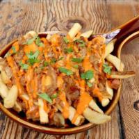 BALDWIN PARK FRIES · grilled onion, cheddar cheese, drive in sauce, parsley  (fries fried in fryer with gluten pr...