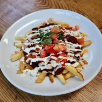 CHILI FRIES · fries, veggie chili, cheddar, lime crema, diced onion, tomato, cilantro. (fries fried in fry...