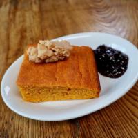CORNBREAD · sweet potato corn bread, cinnamon butter, sour cherry jam