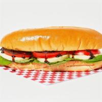 Caprese Sub · Layers of fresh mozzarella, spring mix, tomato, basil, and balsamic on a hoagie roll.