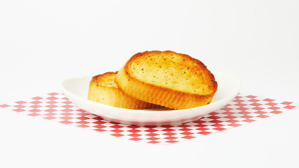 Garlic Bread · Two slices of classic garlic bread.