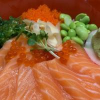 Sake Donburi · Sliced salmon, ikura, tobiko, edamame, seaweed salad, over sushi rice