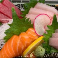 Sashimi Platter · Chef’s choice of twelve pieces sliced raw fish with side steamed rice. NO SUBSTITUTION