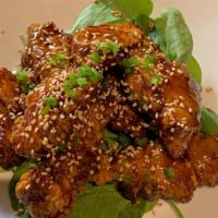 Spicy Sesame Chicken · Battered & fried chicken breast with Teriyaki-Sriracha & tossed jalapeno