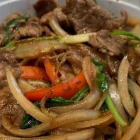 Beef Donburi · Stir fried thinly sliced beef rib-eye and vegs with teriyaki sauce, over rice