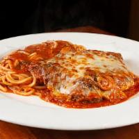 Chicken Parmigiana · Dipped in flour, egg batter, & bread crumbs and sautéed. Then baked with marinara sauce and ...
