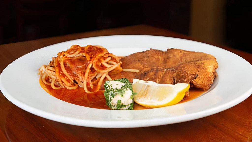 Veal Milanese · Veal dipped in flour, eggs & bread crumbs sautéed served with a dollop of butter and wedge of lemon