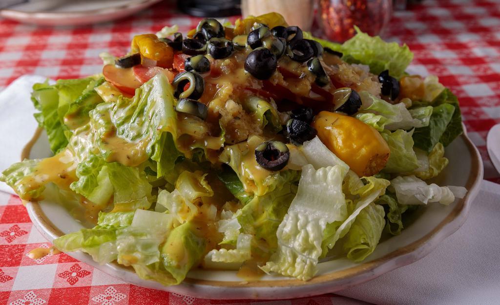 Gaspare's Special Salad · Gluten free. Romaine, tomatoes, olives, onions, garlic and pepperoncini. Regular size good for 2 people.Lg good for 3-4