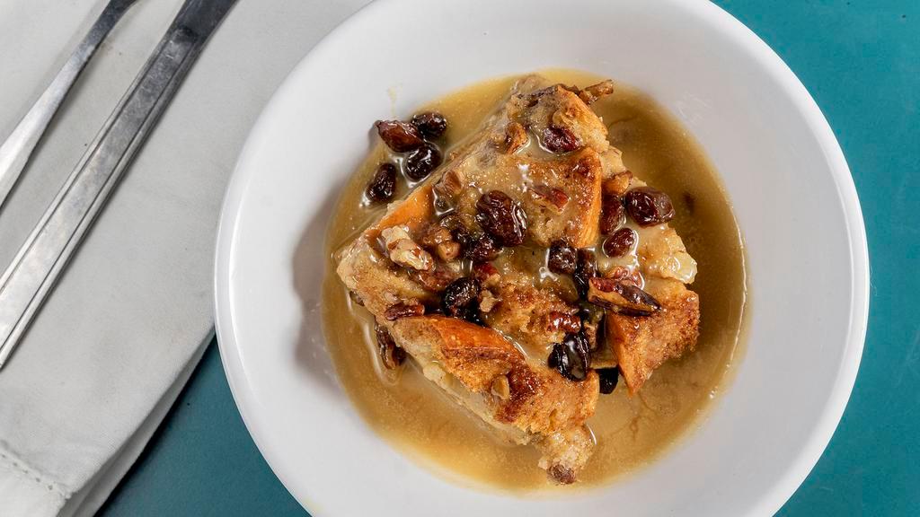 Bread Pudding · A Poor House Favorite!  Served with New Orleans praline sauce.