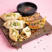 Vegetable Gyoza (5 pcs) · A wholesome blend of cabbage, onions, carrots, corn, spices. With (choose 1): Hot sauce, Hoi...