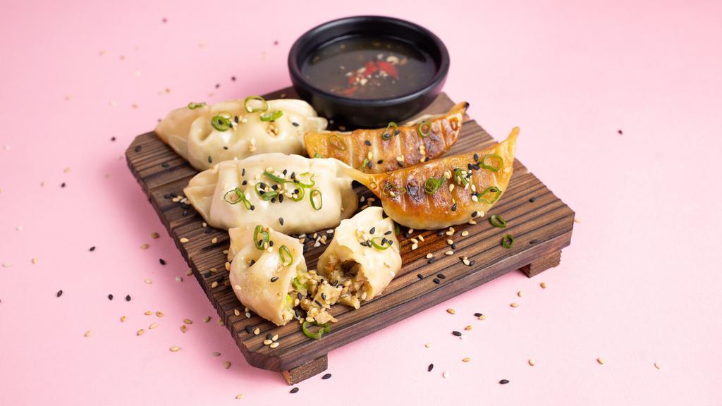 Vegetable Gyoza (5 pcs) · A wholesome blend of cabbage, onions, carrots, corn, spices. With (choose 1): Hot sauce, Hoisin sauce, Ponzu citrus soy sauce.