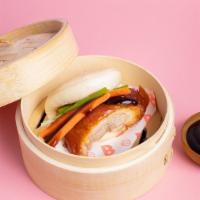 (2) Duck Bao · Two Ginger Steamed buns with roasted duck, pickled carrots, scallions, hoisin sauce. Limited...